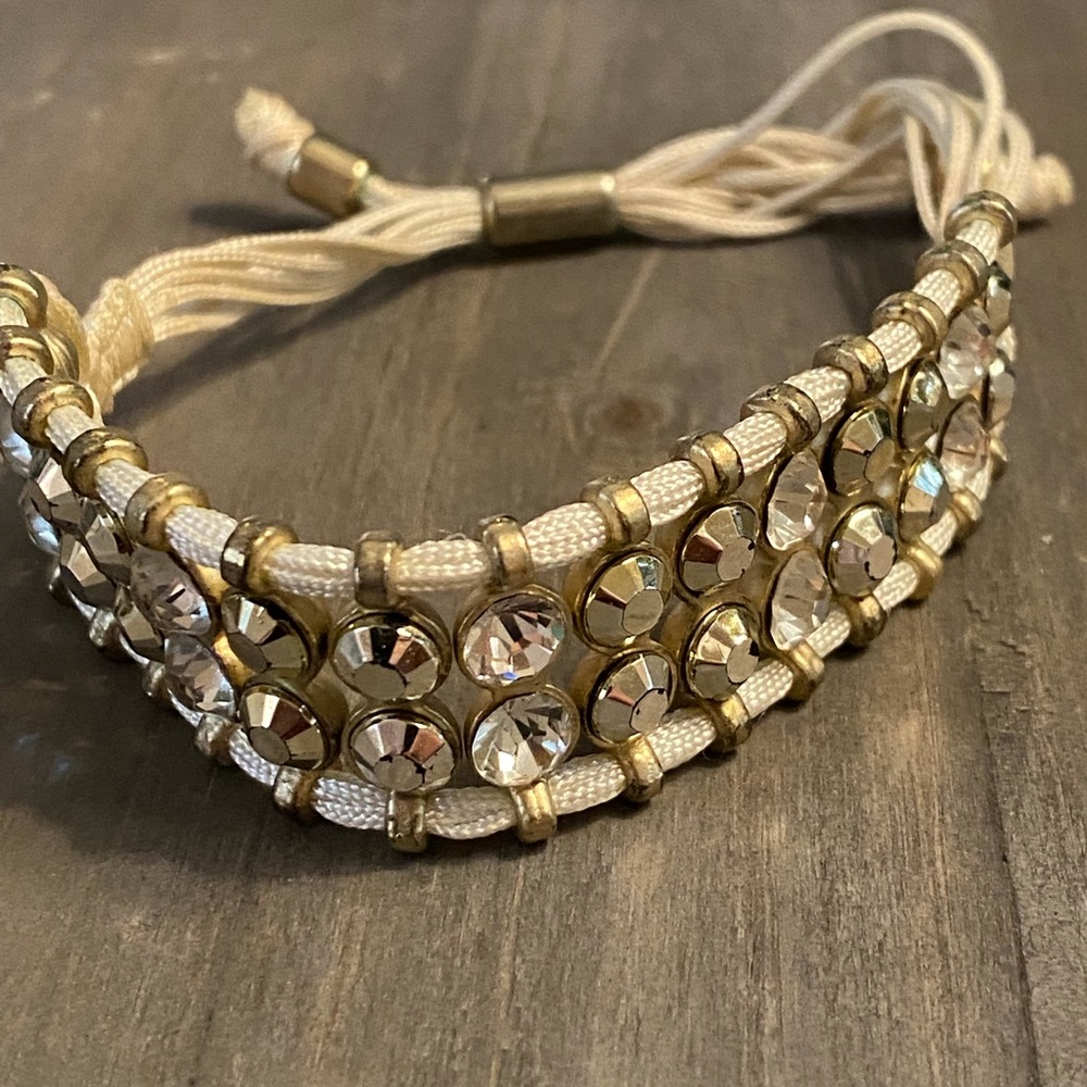 Gold and off white jeweled adjustable bracelet
